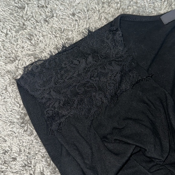 Black bodycon sleeveless dress with lace on shoulders and rushing on left side. - Picture 2 of 4